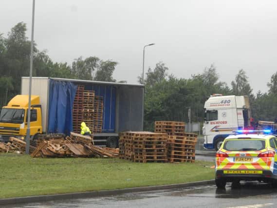 Police continue to manage traffic as a clear-up operation was undertaken this afternoon outside Hucknall.