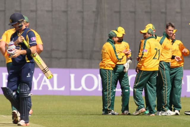 Dan Christian is congratulated after claiming his third wicket of the day- Pic by: Richard Parkes