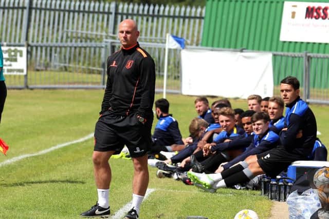 Mansfield Town Manager Adam Murray watches the 2-0 win on Saturday. Picture by Dan Westwell