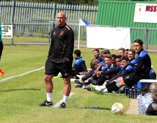 Mansfield Town Manager Adam Murray watches the 2-0 win on Saturday. Picture by Dan Westwell