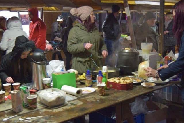 Volunteers serving food at Mansfield Soup Kitchen which has been given two weeks notice to quit.