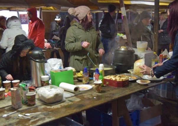 Volunteers serving food at Mansfield Soup Kitchen which has been given two weeks notice to quit.