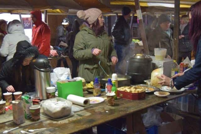 Volunteers serving food at Mansfield Soup Kitchen which has been given two weeks notice to quit.