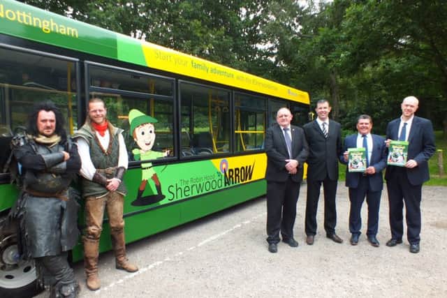 Announcing the Sherwood Arrow as the travel partner for the Robin Hood Festival are (fromt left) Mark Williams (Sherrif of Nottingham), Steve Warrington (Robin Hood), Andy Smith, Jason Dixon (both Stagecoac), Coun Kevin Greaves, Coun John Knight (both Nottinghamshire County Council).
