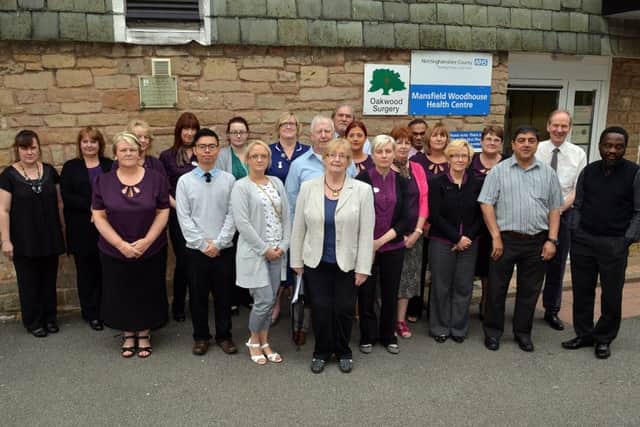 Oakwood Surgery, Mansfield Woodhouse, pictured includes chair of PPG Sheila Ormerod, vice chair Andrew Hughes, PPG member Peter Sutcliffe, Dr Butt, Dr Firth with staff