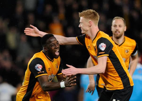 Adama Diomande celebrates his opening goal with Sam Clucas.
Hull City v Wolverhampton Wanderers. Skybet Championship. KC Stadium.  15 April, 2016.  Picture Bruce Rollinson