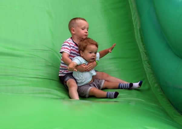 Alfie Carr and Noah Fownes went for a ride on the giant slide.
