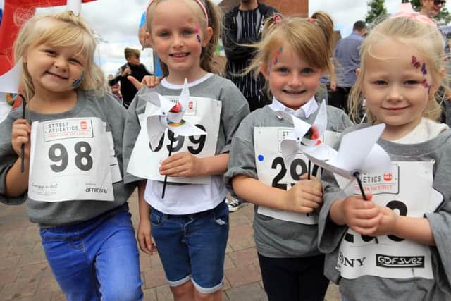 Kirkby Town Centre Street Athletics event with Linford Christie.