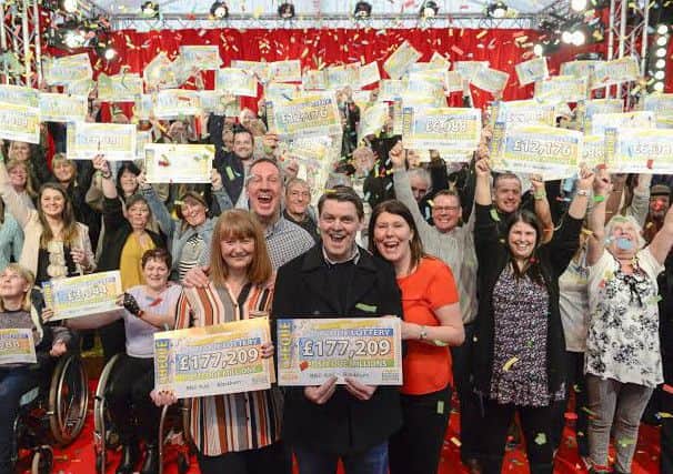 Pictured at Witton Park Blackburn are Peoples Postcode Lottery winners.  All pictures cleared for release.  Pictures Copyright Darren Casey / DCimaging 07989 984643   Strictly no syndication without prior agreement.