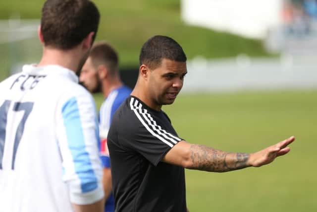 FC Bolsover manager Jordan Hall gives instructions to his players. Pictures by Mark Fear.
