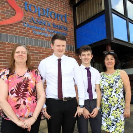 New trainee's at Stopford Associates Chartered Accountants in Mansfield. Both trainee's came from Queen Elizabeth's School. Shaun Newham and William Bostock are pictured with Sharon Hall, Post 16 Lead at Queen Elizabeth's School, and Pat Stopford.