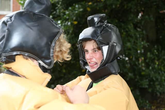 Hayden Bartlet, 15, from Mansfield, sumo wrestling at Parkfest. Picture by Mark Fear.