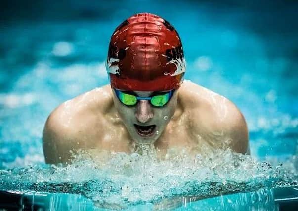 ELLIOT CLOGG -- Mansfield swimmer who stole the show again.