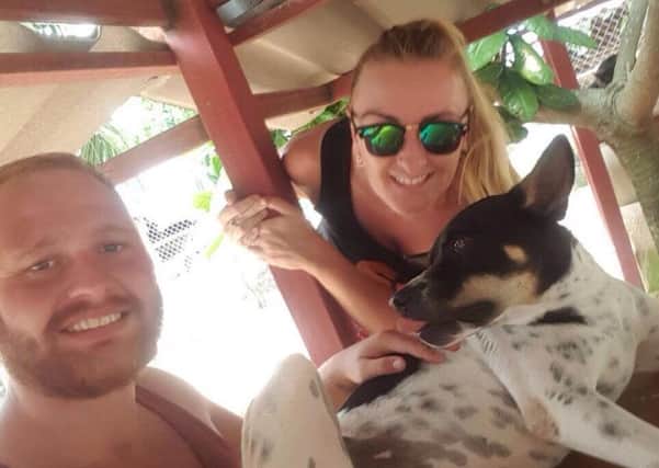 Jake Pearson and Amy Short of Hucknall are volunteering at the Soi Dog sanctuary in Thailand and want to raise cash for a health programme.