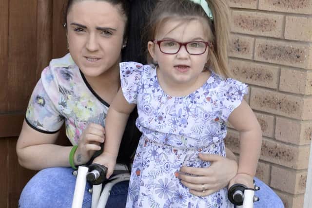 Shontelle Austin with daughter Iyra, four, who suffers with Cerebal Palsy