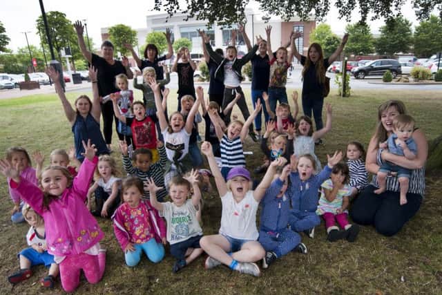 28 July 2016.Butterfly themed craft workshop for children at the McArthurGlen York Designer Outlet.Children from Funfishers out of school club.