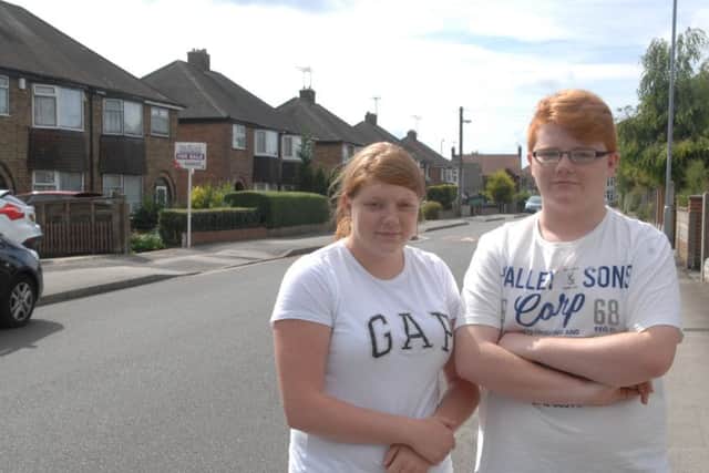 Teens Ashley and Stephen Huggins said they were worried to leave the house alone since the stabbing (Image: Nick Charity).
