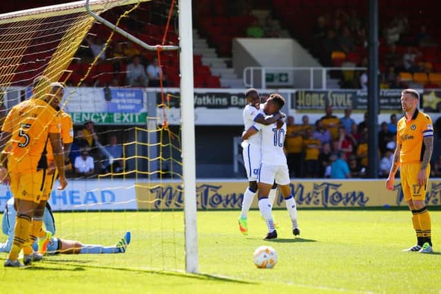 Mansfield Town's Matt Green celebrates with teammate Mitchell Rose  - Pic by Chris Holloway