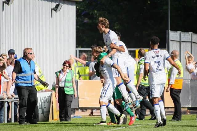 Mansfield Town players celebrate Kevan Hurst's late goal - Pic Chris Holloway