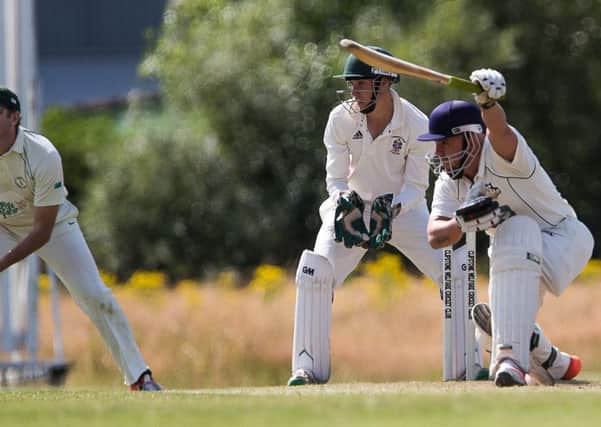 WHO NEEDS TWO HANDS? -- Clipstone's Craig Brittlebank executing a perfect cover drive, despite losing grip of his bat. (PHOTO BY: Andy Sumner)