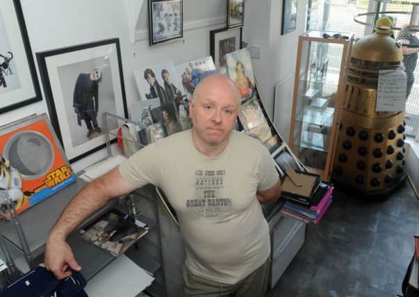 Sci-Fi Toy Shop owner John Hadlow has branded theives 'low-life scum' after his shop was broken into, and numerous collectibles were stolen.