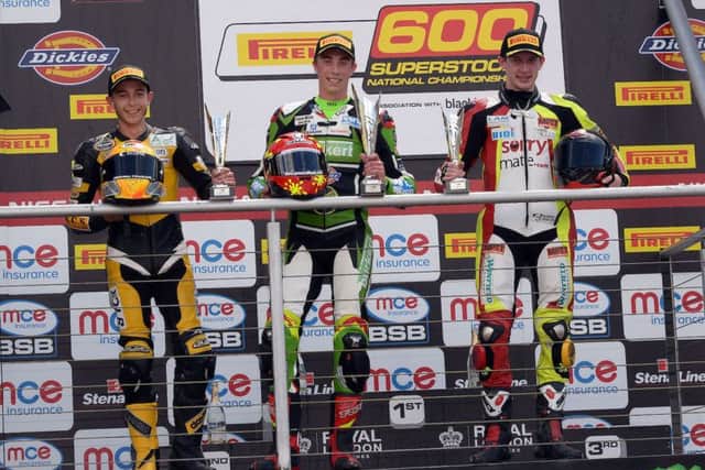 Taz Taylor, left, on the Brands Hatch podium at the weekend.
