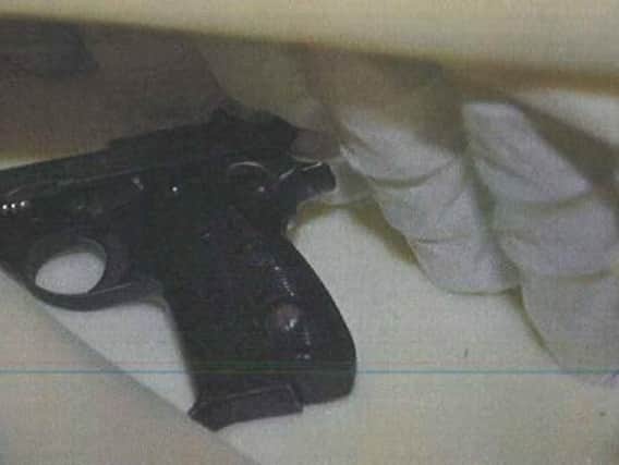 A Beretta handgun found in a mattress was seized by police as part of an operation to take down a Notts drug ring.