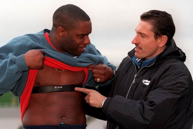 FILE PICTURE Dalian Atkinson with trainer Ed Baranowski in 1998. (SWNS)