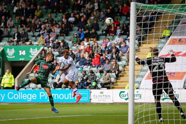 Mansfield Town's Ashley Hemmings heads for goal - Pic by Chris Holloway