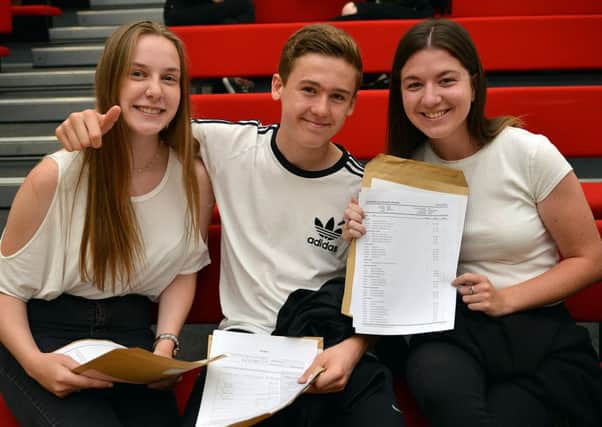 Samworth Academy GCSE results day, pictured are from left Kirsty Gregson, Luke Sansom and Alisha Gibbs