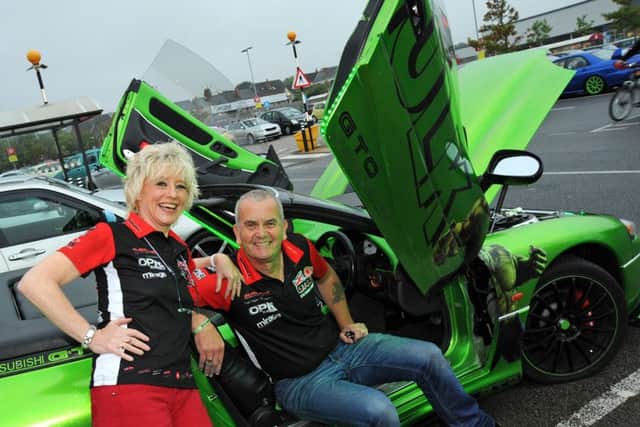 Steve and Tracy Parkin of Sheffield with their Mitsubishi GTO.