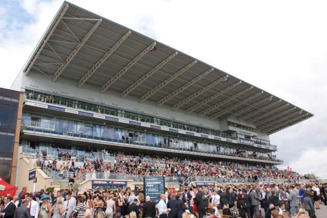 WE LOVE THE LEGER! -- packed crowds are guaranteed at Doncaster next week for the four-day Ladbrokes St Leger Festival.