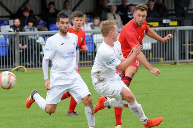 Action from Rainworth Miners Welfare (in white) against Heanor Town on Saturday in the FA Vase, Heanor running out 4-1 winners. All photos by Anne Shelley.