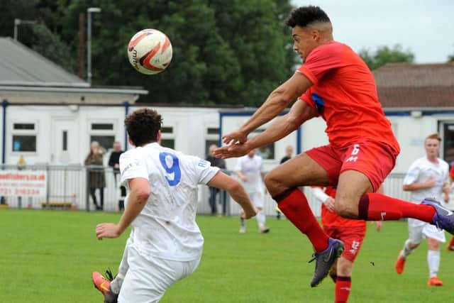 Action from Rainworth Miners Welfare (in white) against Heanor Town on Saturday in the FA Vase, Heanor running out 4-1 winners. All photos by Anne Shelley.