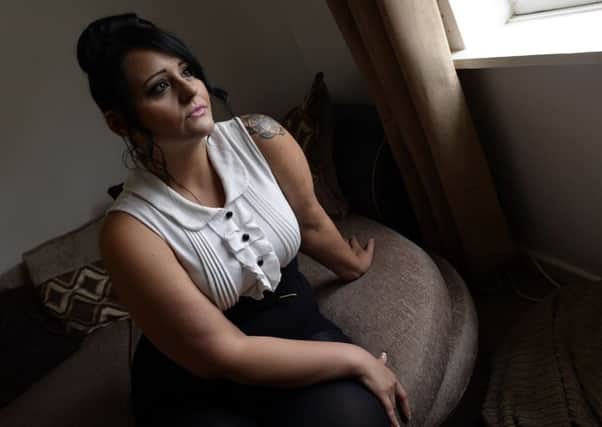 Becki Cuttell at her home in Clipstone. Despite losing a lot of weight in the past year she has been denied surgery to correct a weight disorder ffecting her legs.