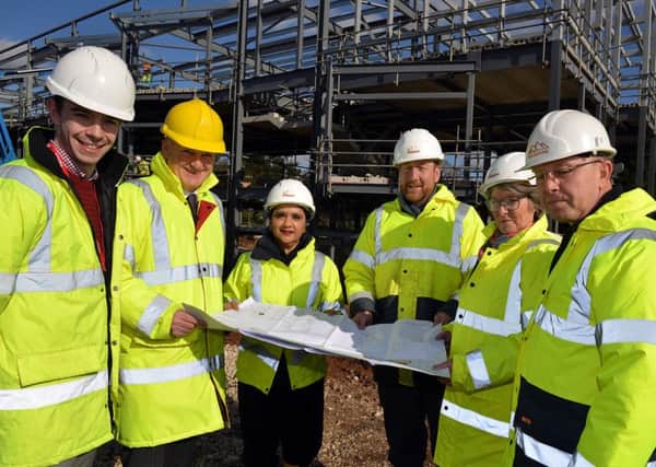 College chiefs and business leaders check progress on the new Â£6.5m Vision University Centre being constructed at West Nottinghamshire Colleges Derby Road campus. Picture: Rachel Atkins.