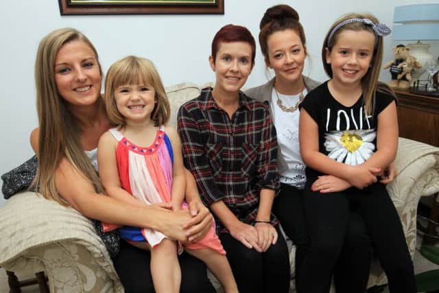 Liz Sheppard from Mansfield Woodhouse has just a year to live and is calling for information about her cancer becuase doctors are baffled by it. Liz is pictured with two of her children Olivia and Grace and her cousins Jessica Grieves and Fran Grieves.