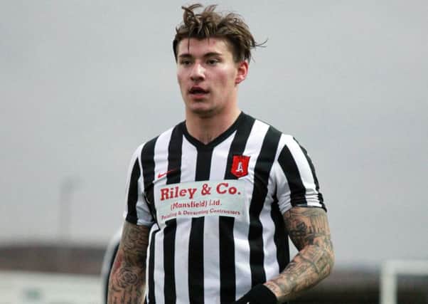 Adam Somes is pictured playing for Clipstone.