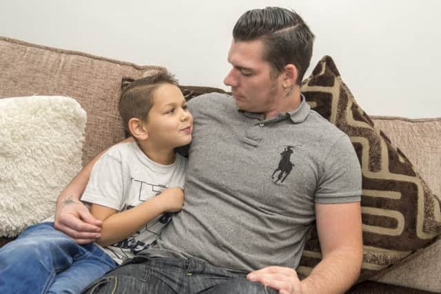 Lewis Smith, nine, absconded from school and walked back to his home in Bilsthorpe. His parents are not happy with how the school dealt with the situation. Pictured with Dad Andy Smith.