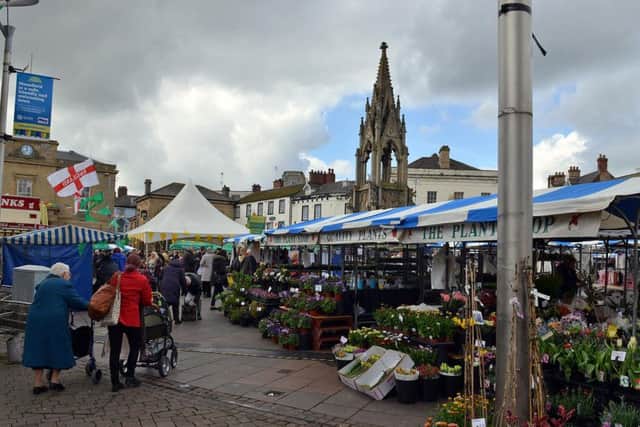 Is new business is to have a grand opening in Mansfield Market Square