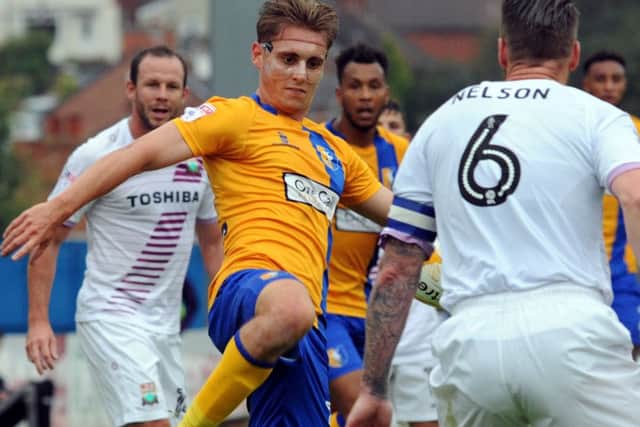 Mansfield Town v Barnet.Danny Rose launches into a masked crusade against the Barnet defense.