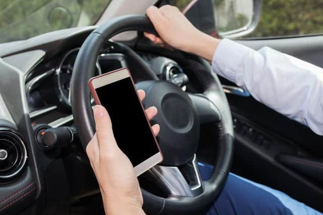 The RAC is calling for an awareness campaign to highlight the dangers of using mobile phones at the wheel.
