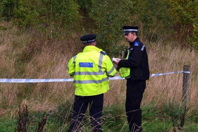 Police at the scene of the assault this morning. Photo -Peter Waby.