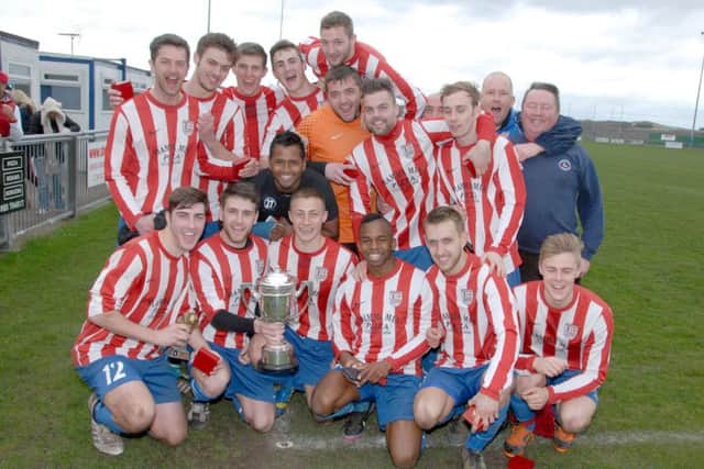 Bilsthorpe Celtic c celebrate their win in the Mansfield Sunday League Premier Cup Final in 2014 against Sutton St Josephs. 06-04-14