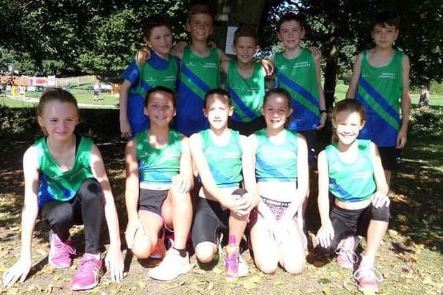 HAPPY HARRIERS -- members of the Mansfield Harriers team who competed at Retford.