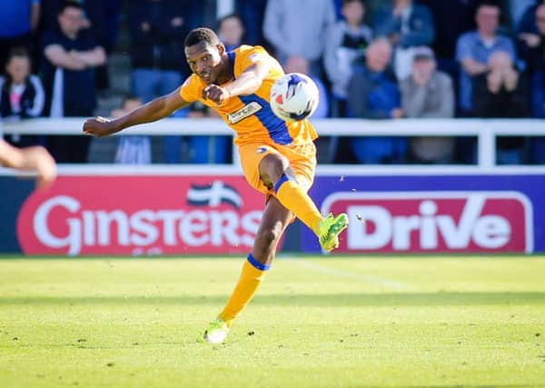 Mansfield Town's Krystian Pearce makes the pass - Pic Chris Holloway