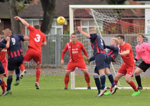 AFC Mansfield get an effort in on goal during their FA Vase win on Saturday. Photo  by Peter Craggs.