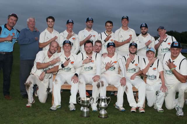 Cuckney CC celebrate claiming the Notts Premier League Trophy three times in the past five years  - Pic by: Richard Parkes