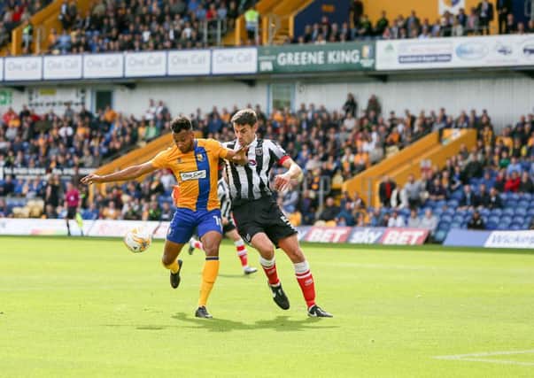 Mansfield Town's Matt Green heads for goal - Pic by Chris Holloway