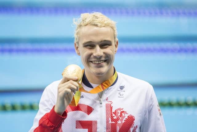 Ollie Hynd MBE with his 400m Freestyle S8 gold medal  - Picture by onEdition